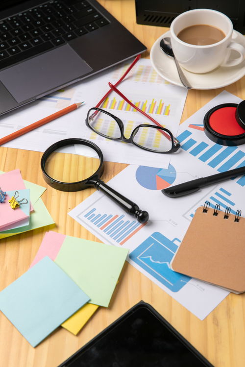 放大鏡數(shù)據(jù)報(bào)表辦公用品商務(wù)攝影圖